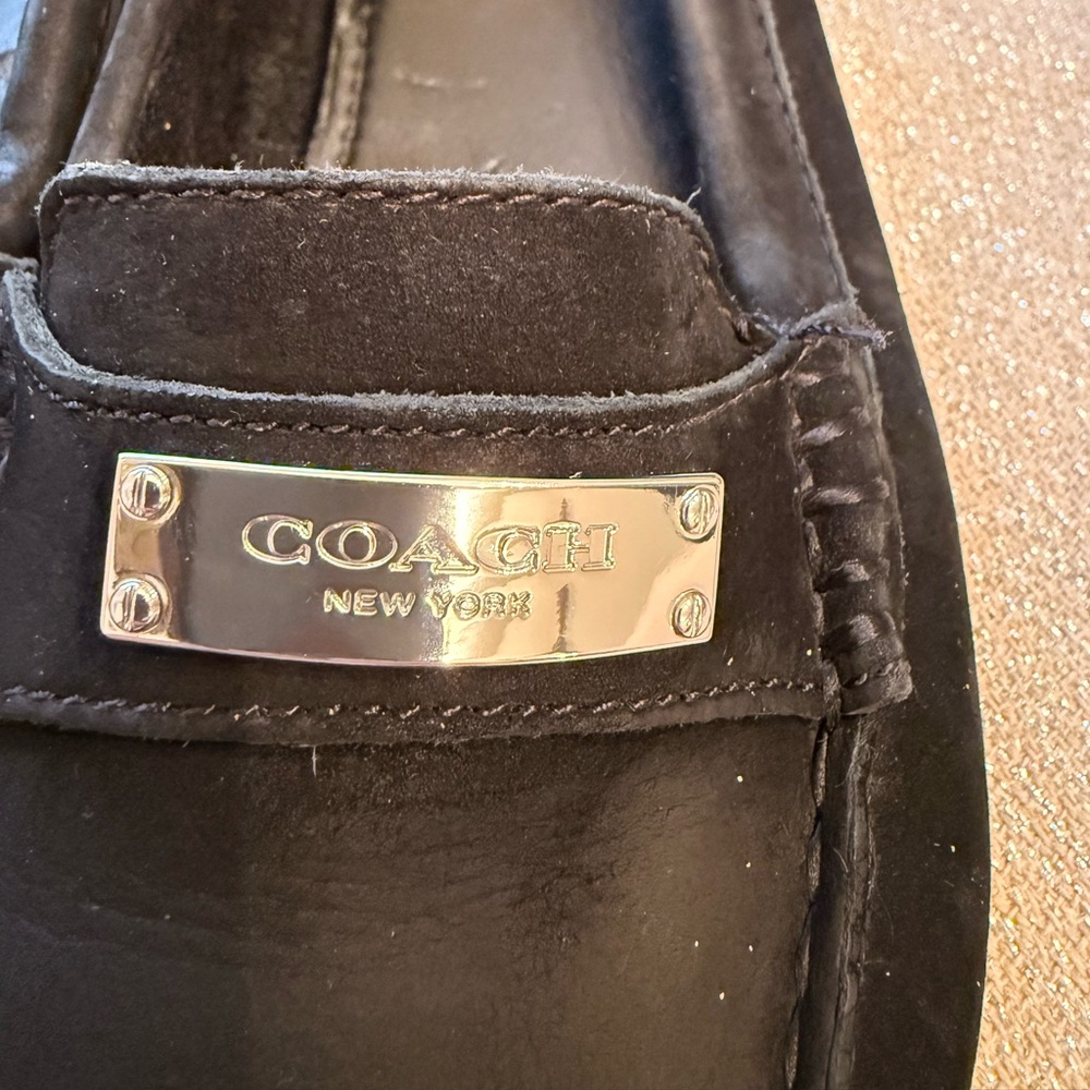 Coach Black Leather Slip-Ons with Silver Accent